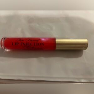 Too Faced Lip Injection Gloss in Tangerine Dream.